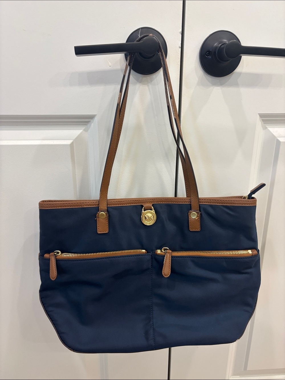 Michael Kors Navy and Tan Purse with Gold Hardware